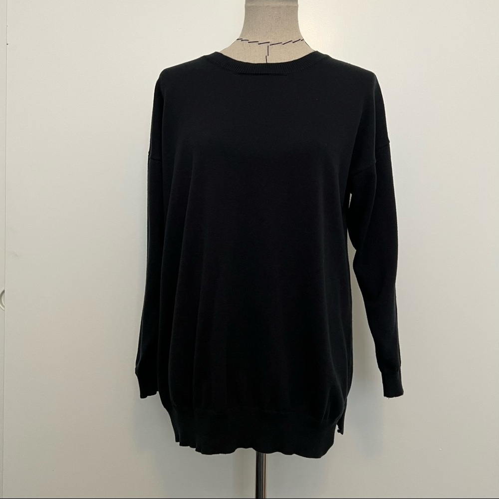 Black woman within sweater